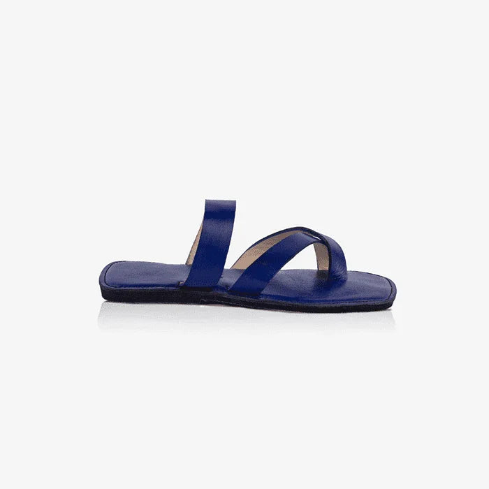 Image of handmade blue leather sandals with cross strap produced by Australian brand Miriam Bella