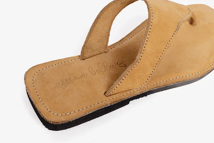 close up of handmade tan leather slides produced by Australian brand Miriam Bella