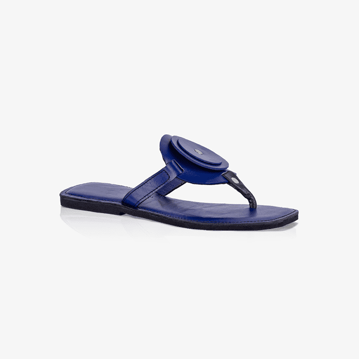 Image of blue women's leather flat sandals with circle design, produced by Australian brand Miriam Bella