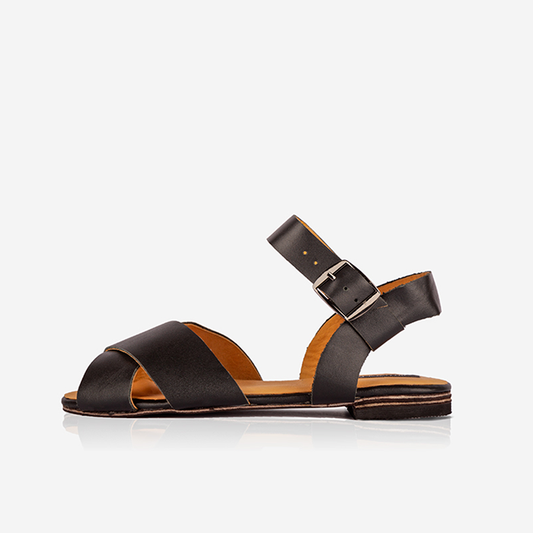 Black Women’s Leather Cross Strap Flat Sandals on a white background