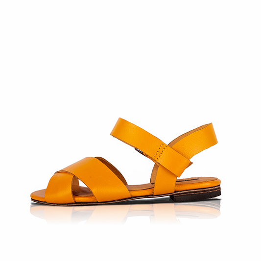 Yellow women's sandals on a white background